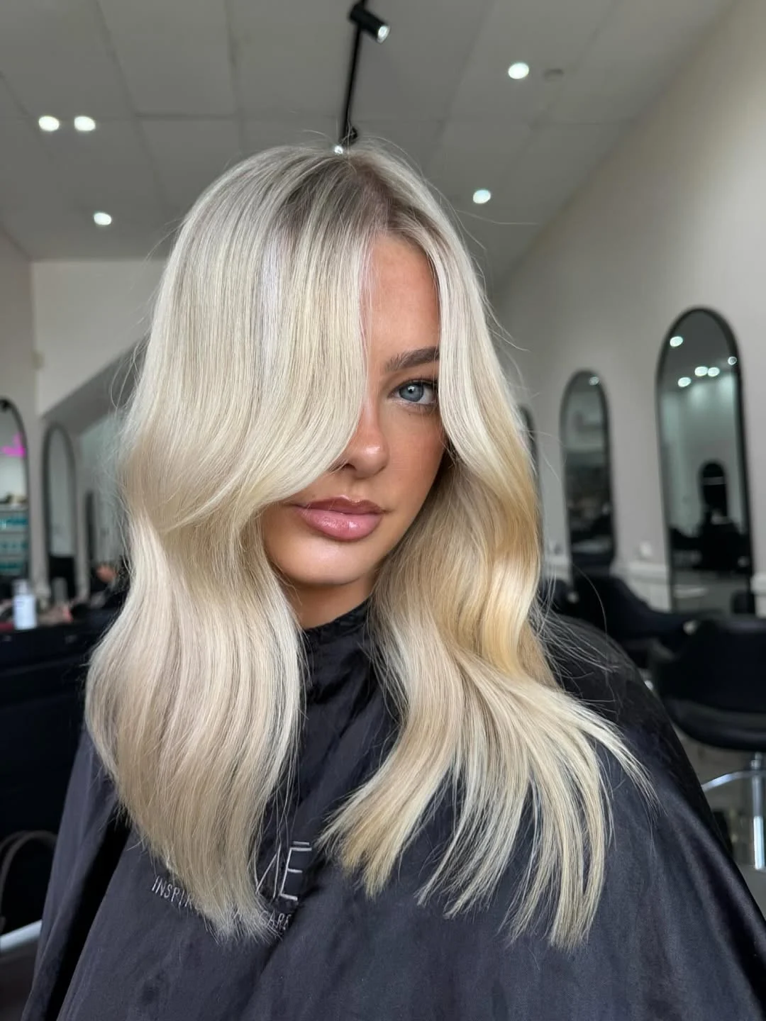 beachy summer blonde hair color 2026 Bright Scandinavian Blonde With Airy Soft Waves