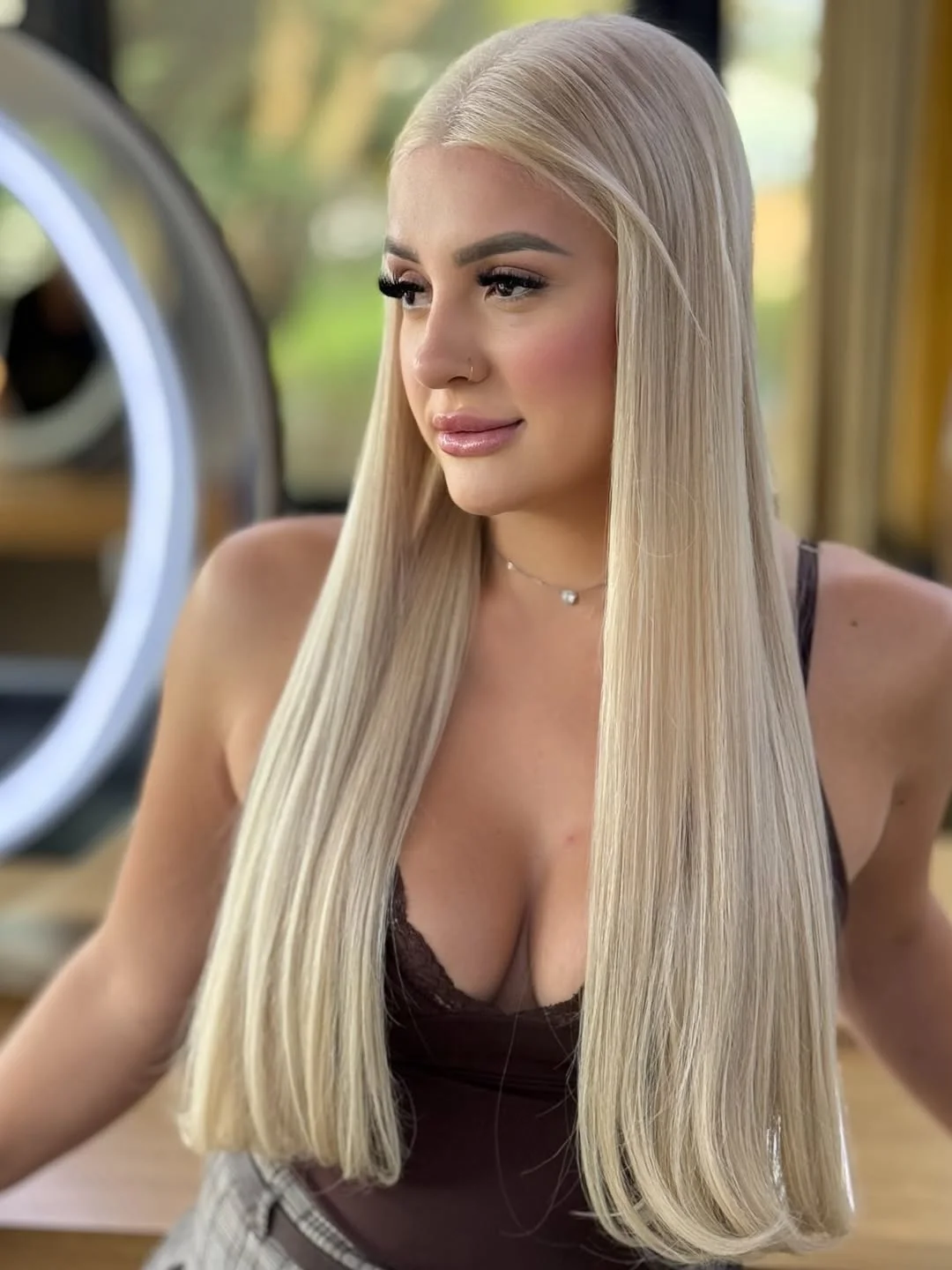 beachy summer blonde hair color 2026 Ultra Sleek Champagne Blonde With Glass Hair Finish
