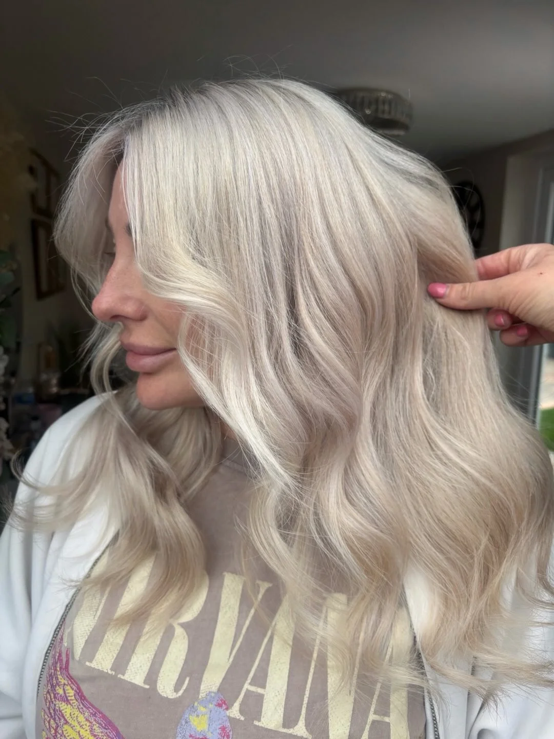 beachy summer blonde hair color 2026 Champagne Blonde Waves With Soft Airy Texture
