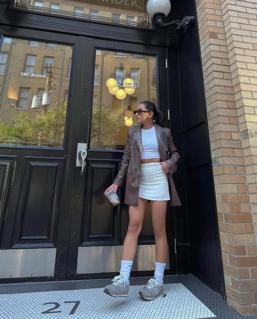 casual summer blazer outfits 2026 Brown Blazer With Mini Skirt And Sporty Sneakers Contrast