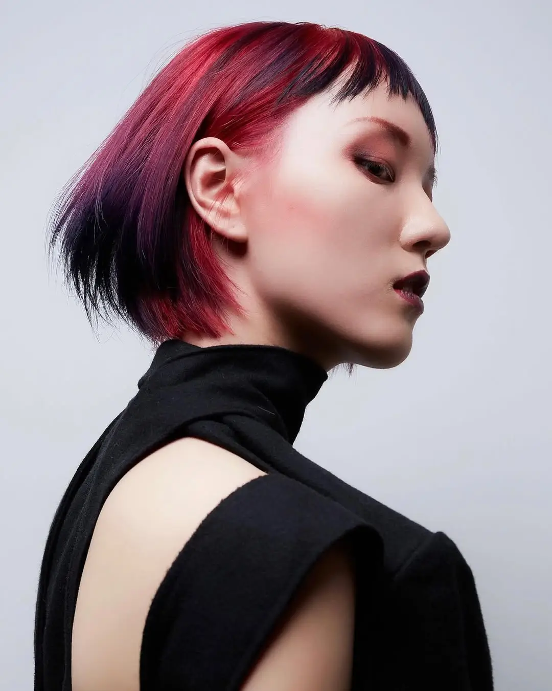 21 choppy summer bob haircut 2026 Sharp Edgy Choppy Bob With Graphic Color Contrast