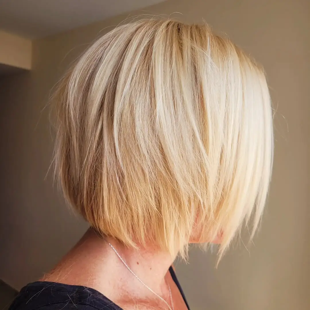 21 choppy summer bob haircut 2026 Soft Blonde Stacked Bob With Feathered Ends