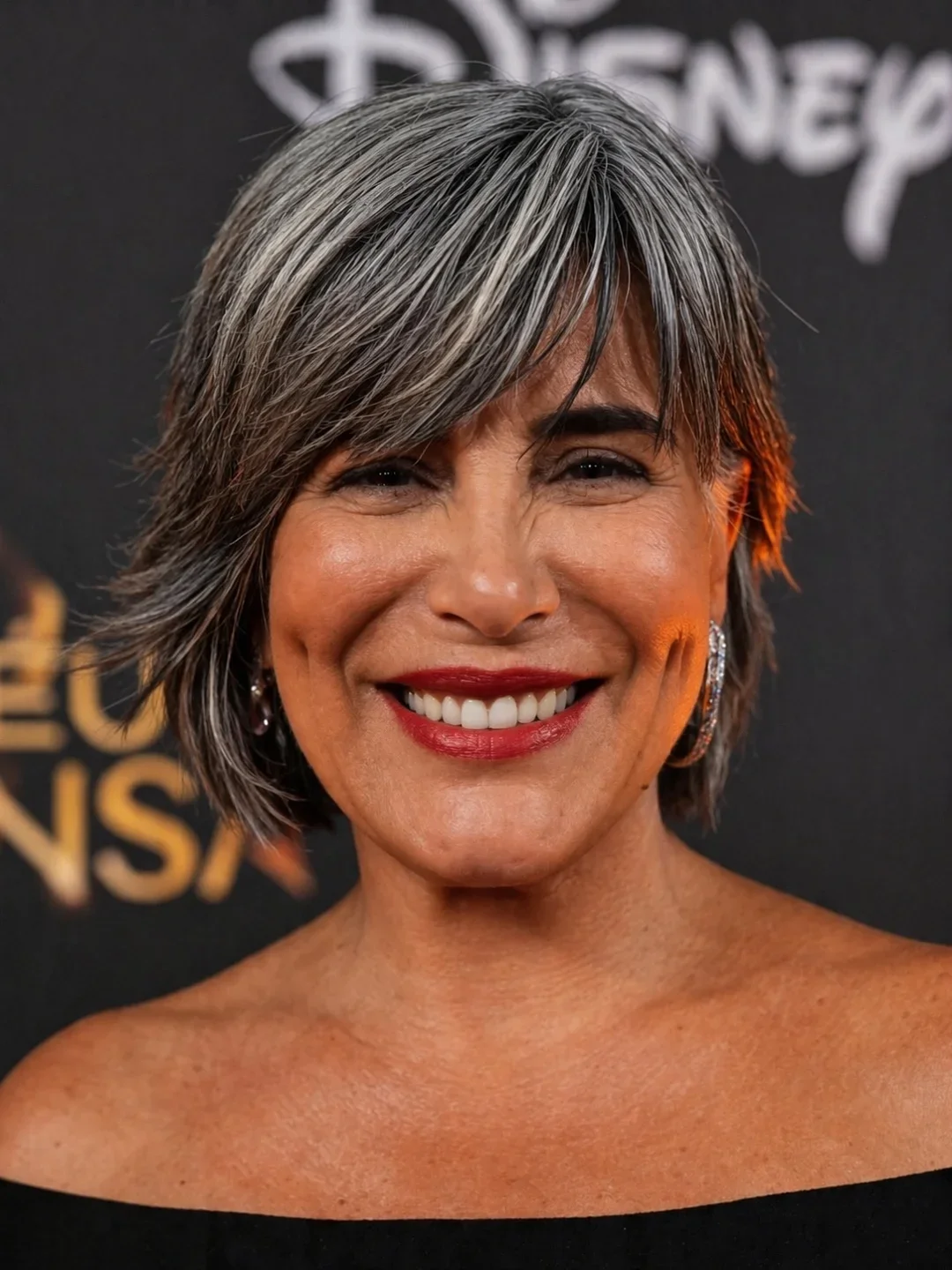 classy summer haircuts for women over 60 2026 Soft Feathered Pixie with Natural Silver Movement