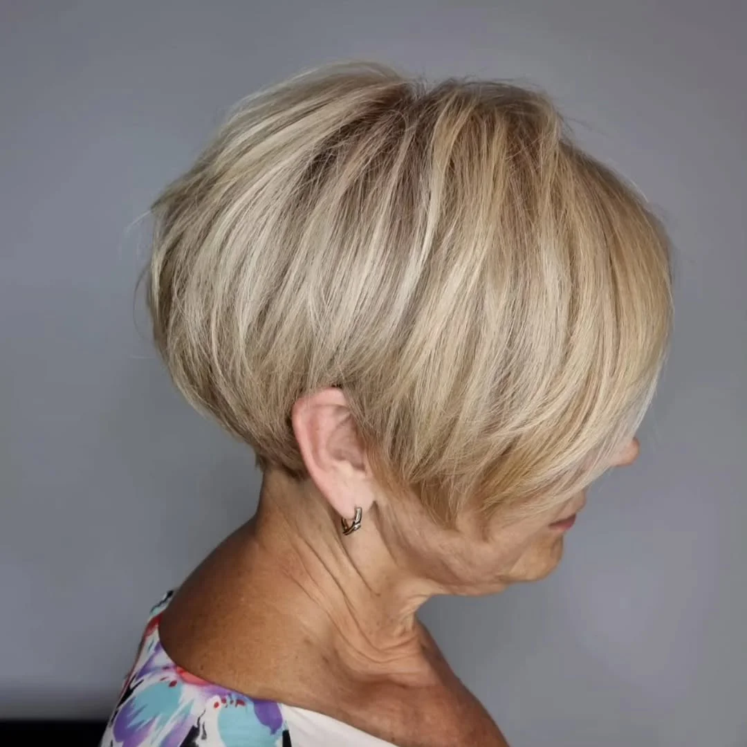 classy summer haircuts for women over 60 2026 Stacked Bob with Soft Graduation and Side Sweep