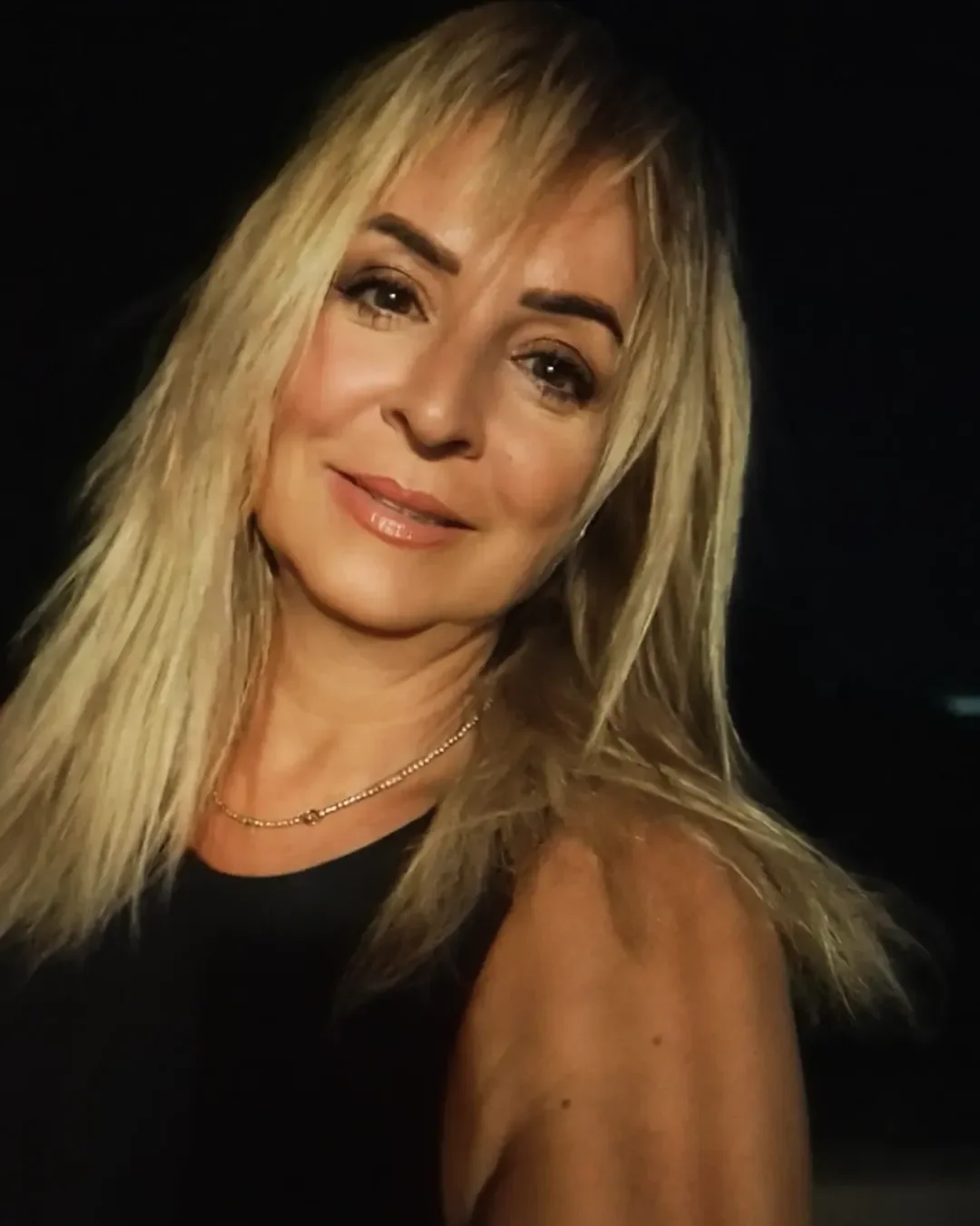 classy summer haircuts for women over 60 2026 Straight Long Layers with Subtle Face Framing