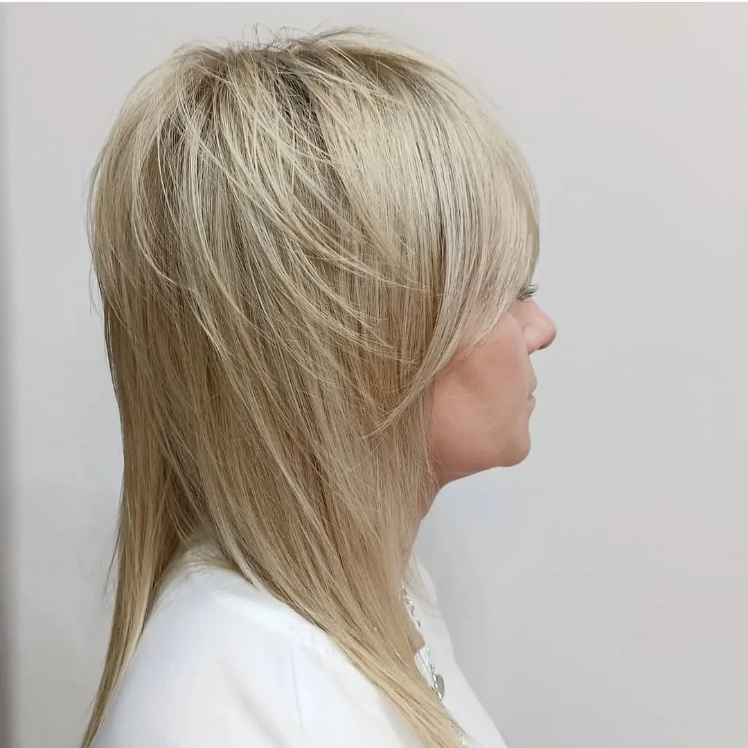 classy summer haircuts for women over 60 2026 Medium Length Layered Cut with Tapered Ends