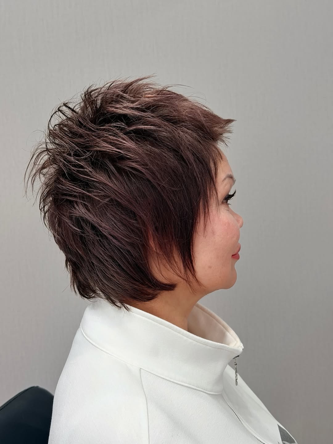 elegant summer haircuts for women over 50 2026 Sassy Short Spiky Cut with Volume