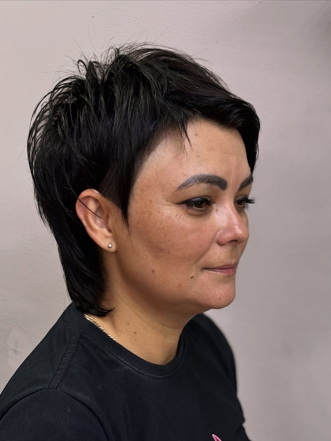 elegant summer haircuts for women over 50 2026 Edgy Short Pixie with Tapered Sides