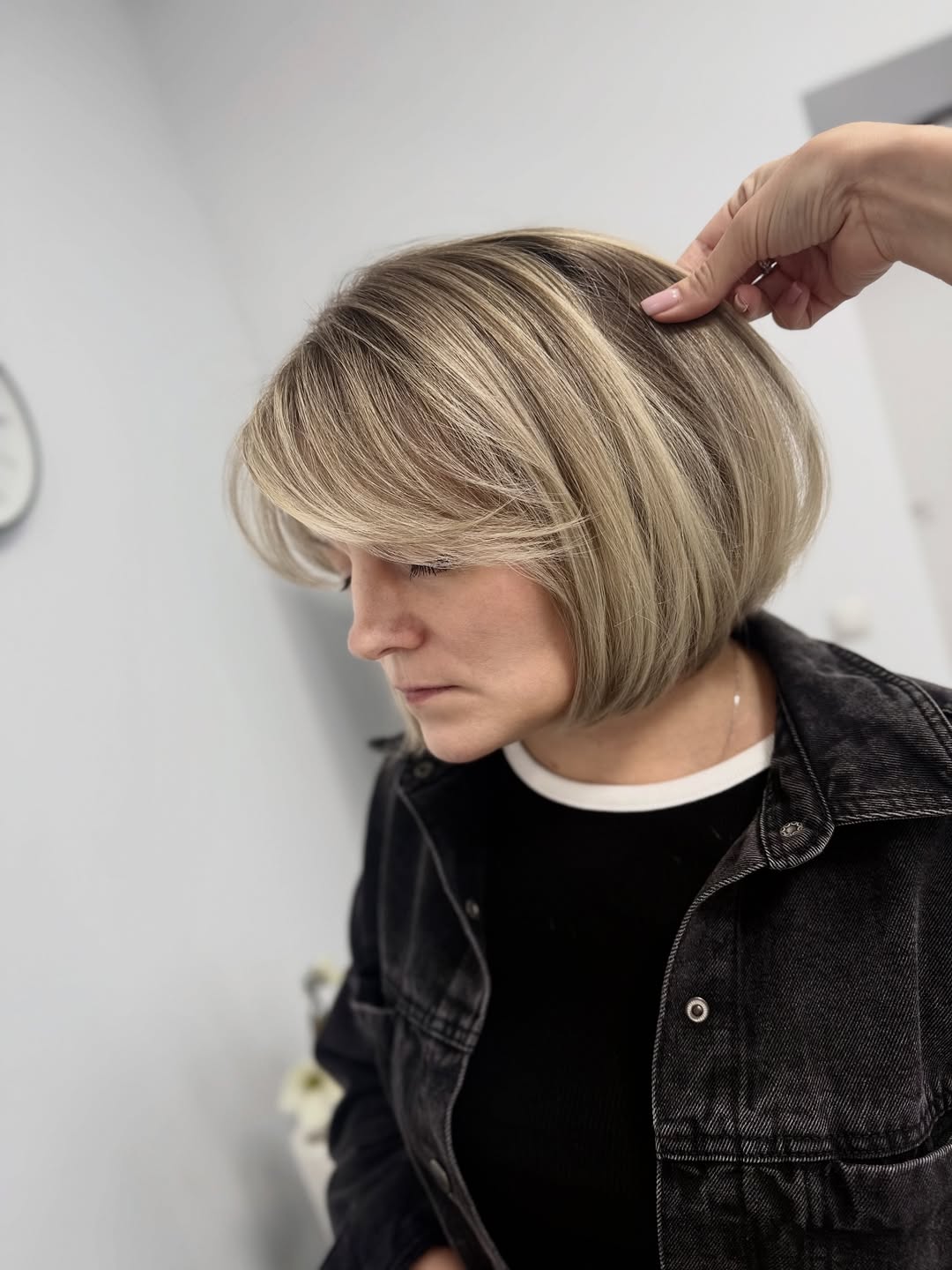 elegant summer haircuts for women over 50 2026 Classic Layered Bob with Soft Highlights