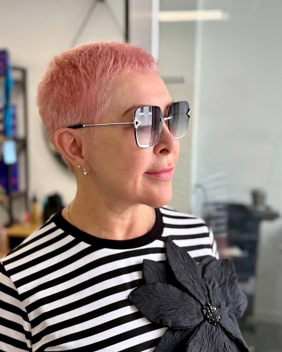elegant summer haircuts for women over 50 2026 Ultra Short Pixie with Soft Color