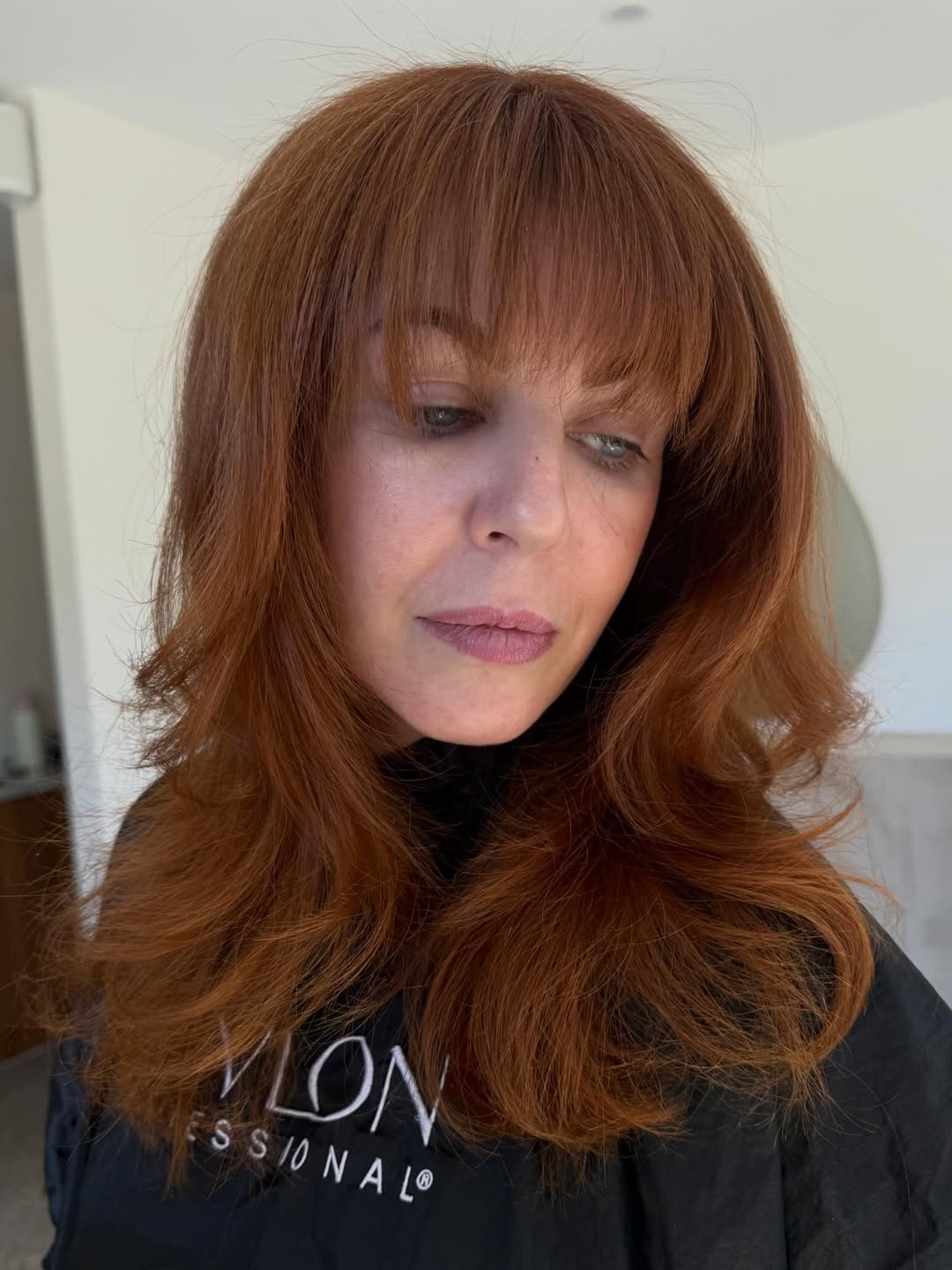 elegant summer haircuts for women over 50 2026 Long Shag with Full Bangs