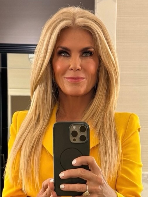 elegant summer haircuts for women over 50 2026 Long Sleek Layers with Volume