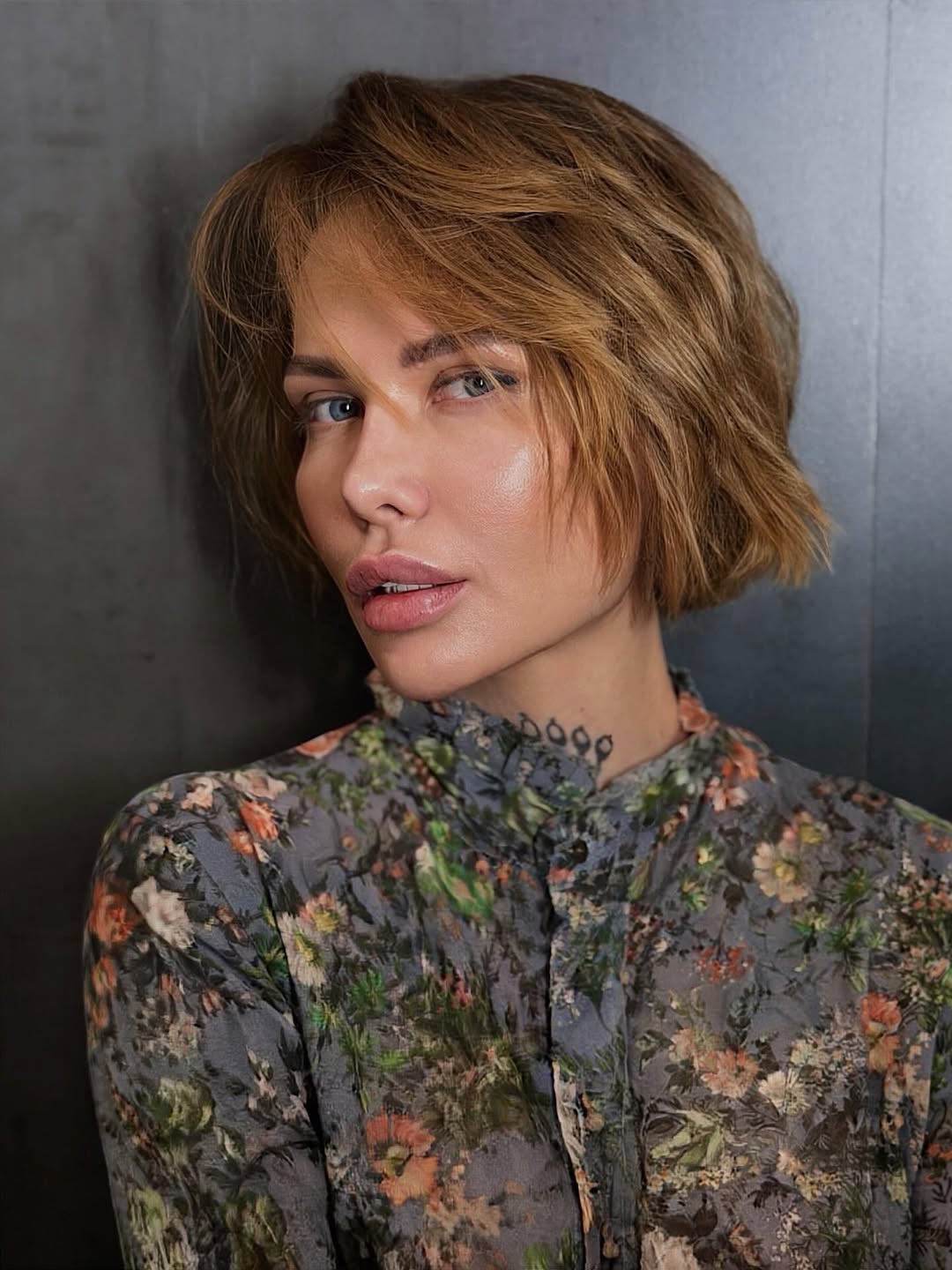 elegant summer haircuts for women over 50 2026 Soft Layered Bob with Natural Texture