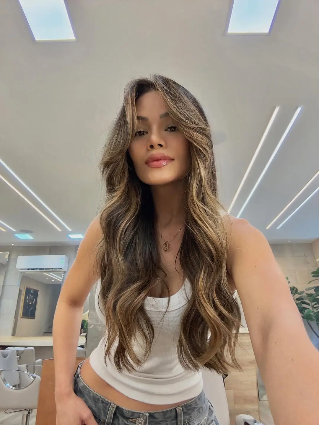 face framing summer haircuts for long hair 2026 Sunlit Balayage Layers with Soft Curtain Movement