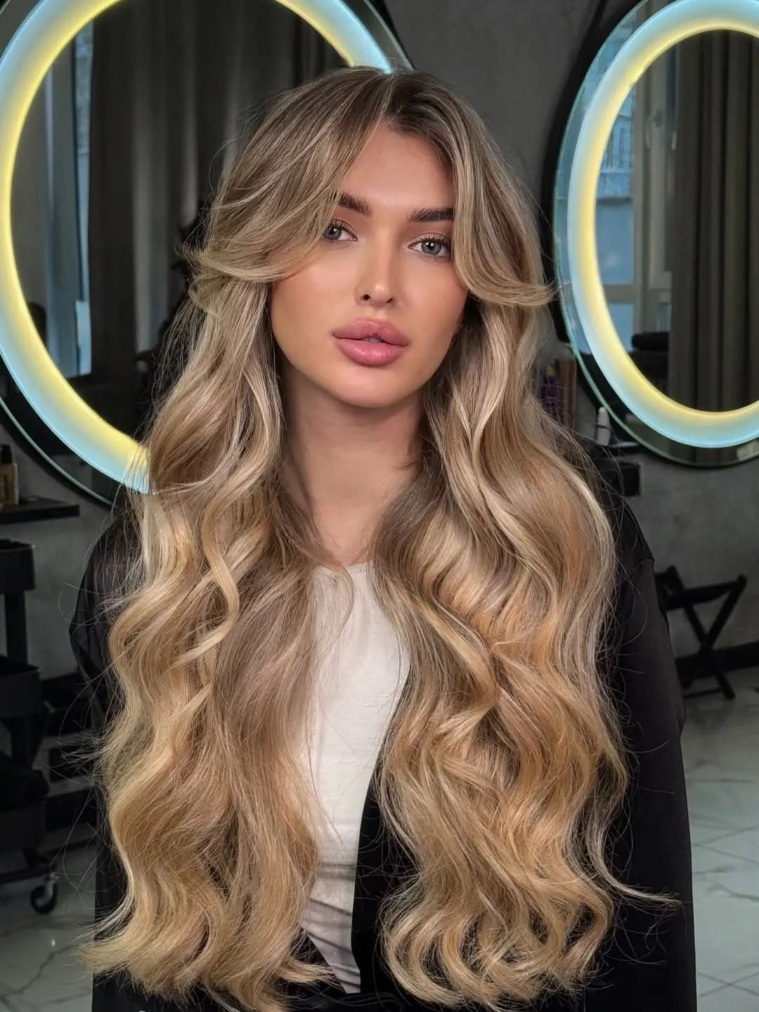 face framing summer haircuts for long hair 2026 Golden Curtain Layers with Soft Dimensional Waves