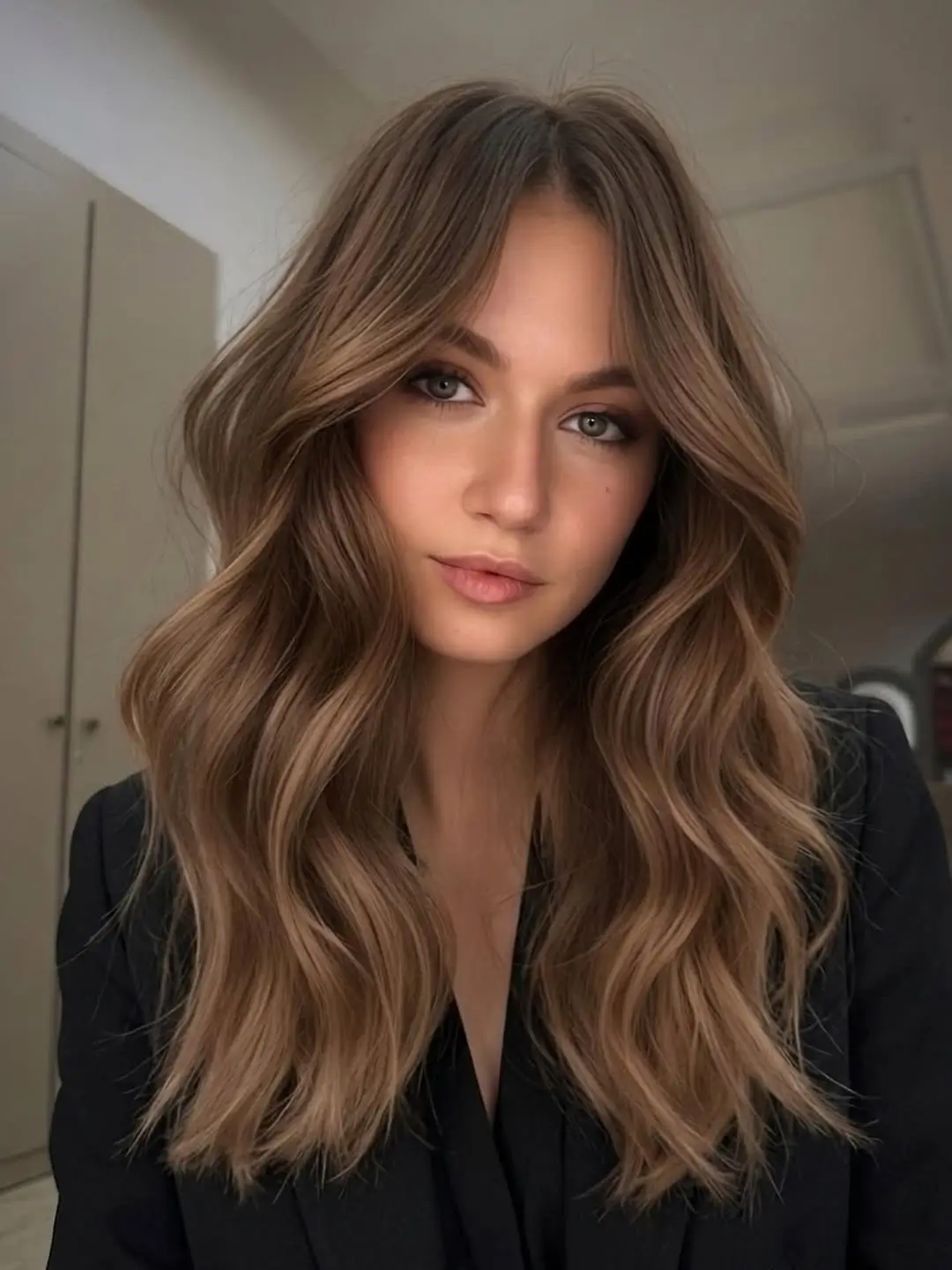 face framing summer haircuts for long hair 2026 Muted Brunette Waves with Subtle Face-Framing Blend