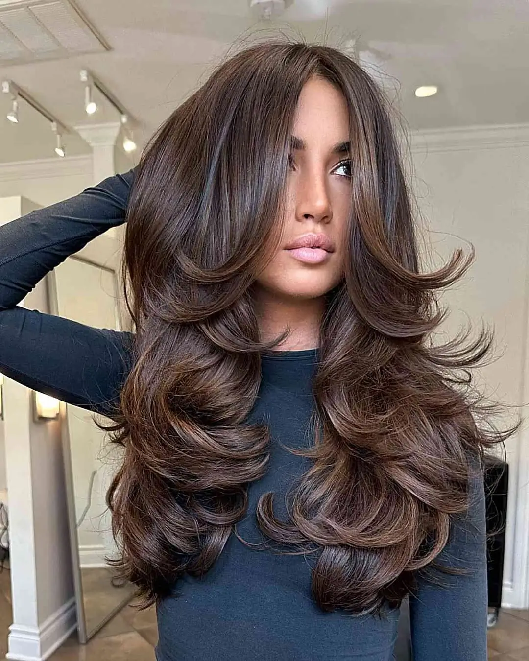 face framing summer haircuts for long hair 2026 Voluminous Chocolate Layers with 70s-Inspired Bounce