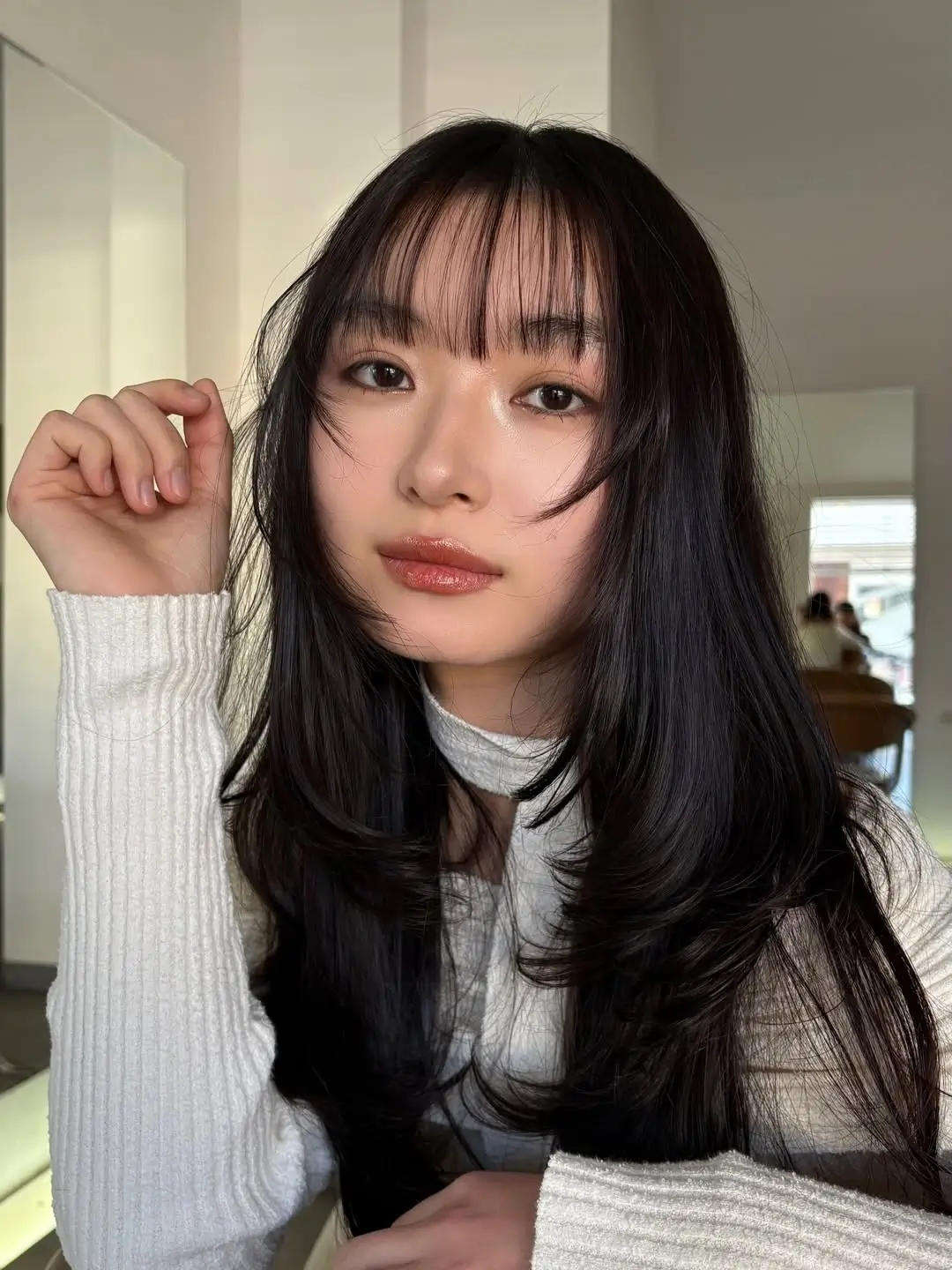 face framing summer haircuts for long hair 2026 Soft Black Layers with Wispy Front Fringe