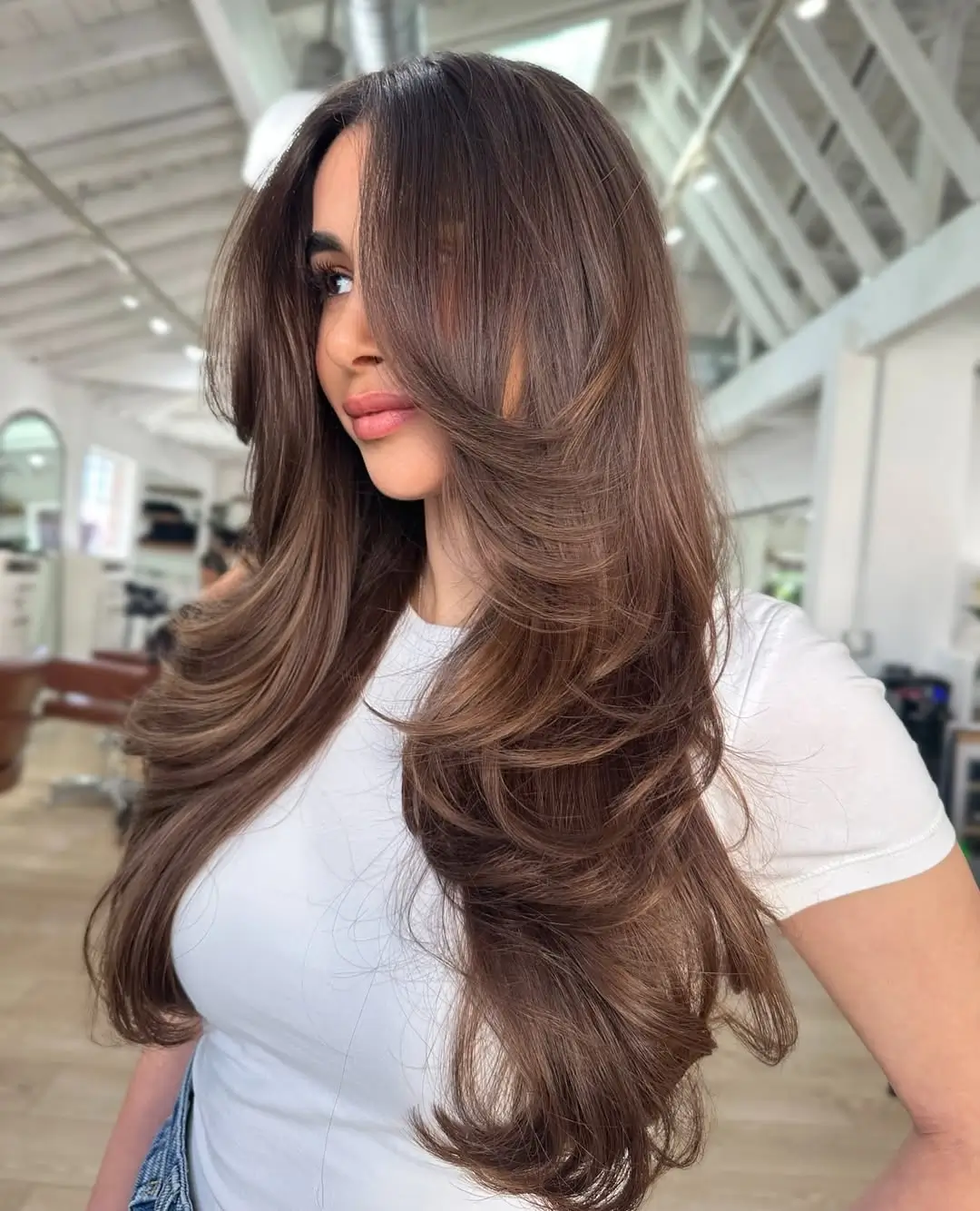 face framing summer haircuts for long hair 2026 Polished Butterfly Layers with Sculpted Volume