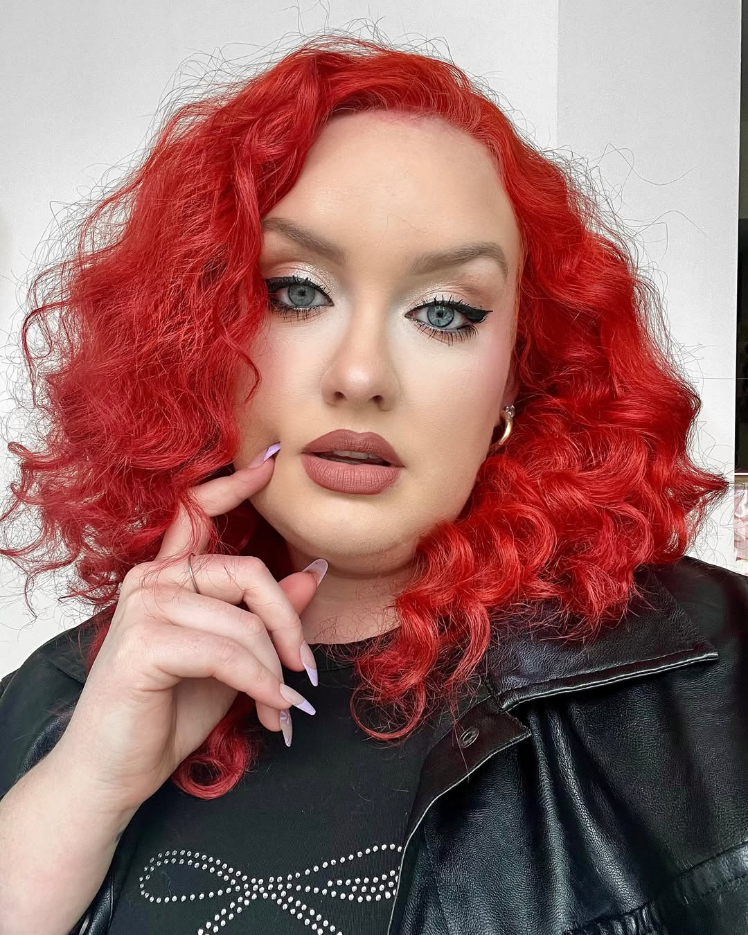 face-framing summer haircuts for plus size women 2026 Bold Red Textured Curly Lob with Side Volume