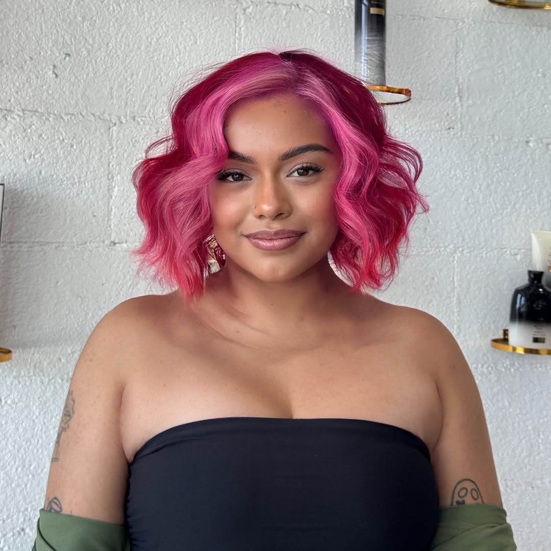face-framing summer haircuts for plus size women 2026 Playful Short Curly Bob in Bold Pink