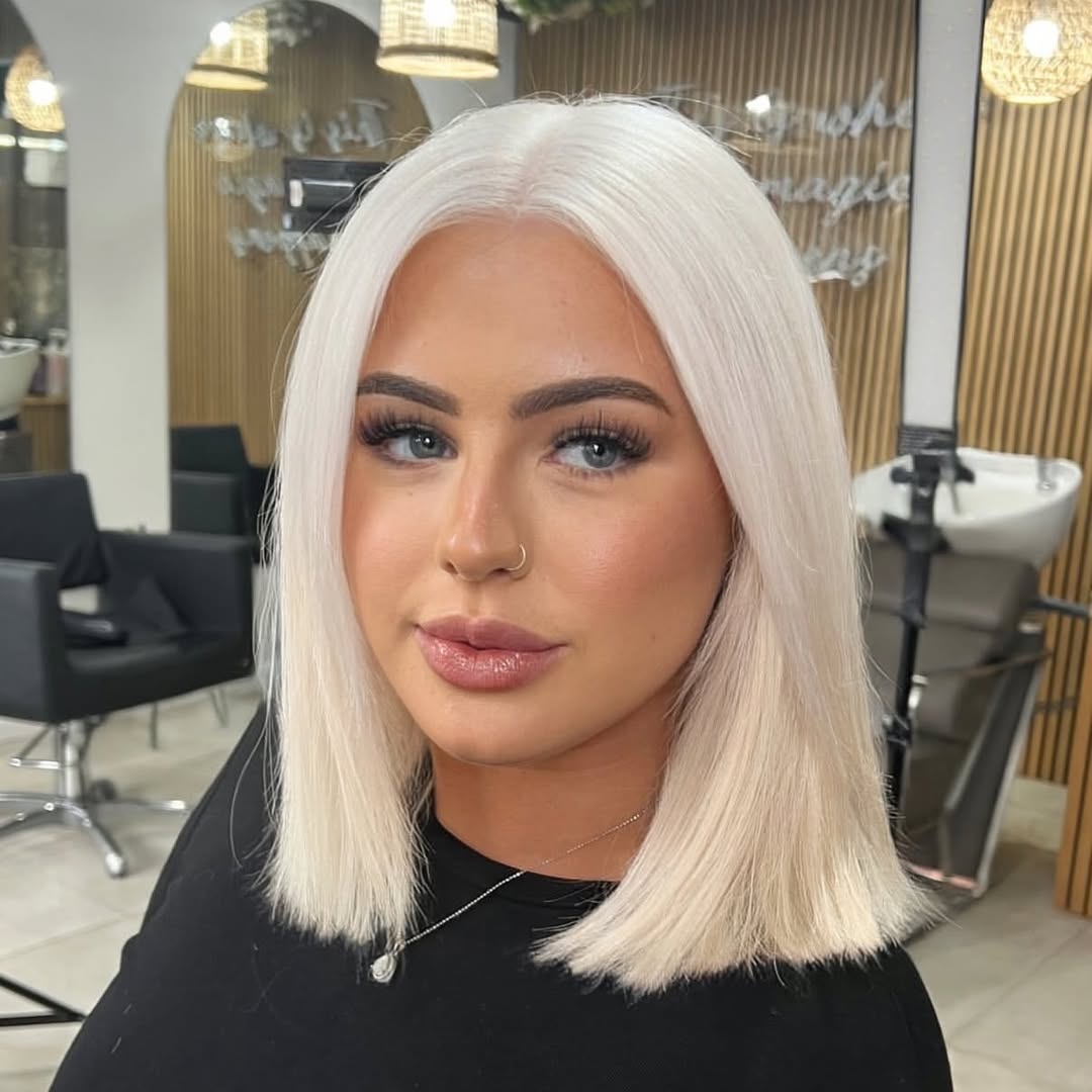 face-framing summer haircuts for plus size women 2026 Sleek Icy Blonde Blunt Lob with Center Part