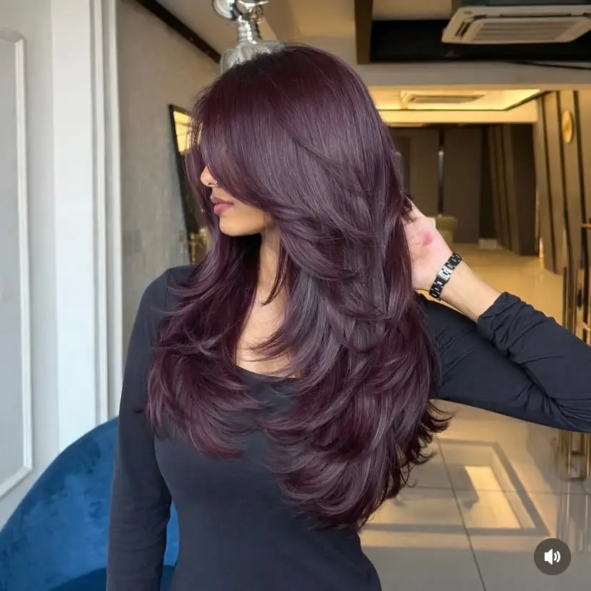 face-slimming-summer-haircut-for-round-face-2026 deep-burgundy-layered-length-with-soft-volume
