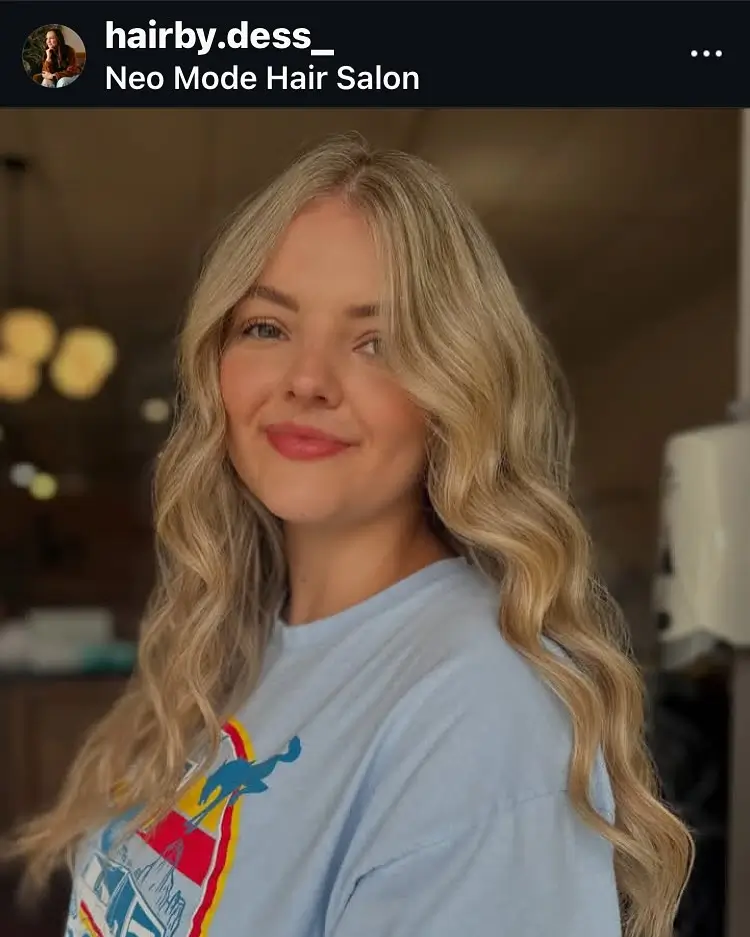 face-slimming-summer-haircut-for-round-face-2026 long-soft-blonde-waves-with-center-flow