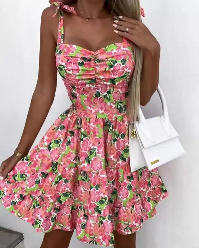 24 floral summer sleeveless dresses 2026 Playful pink short floral dress with voluminous cute layers