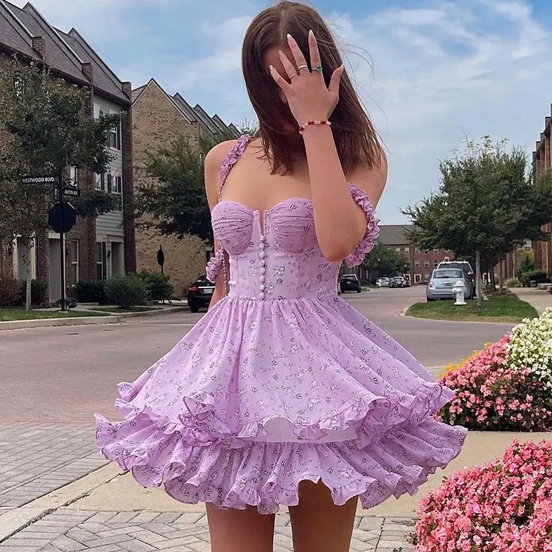 24 floral summer sleeveless dresses 2026 Playful purple short floral dress with voluminous layers