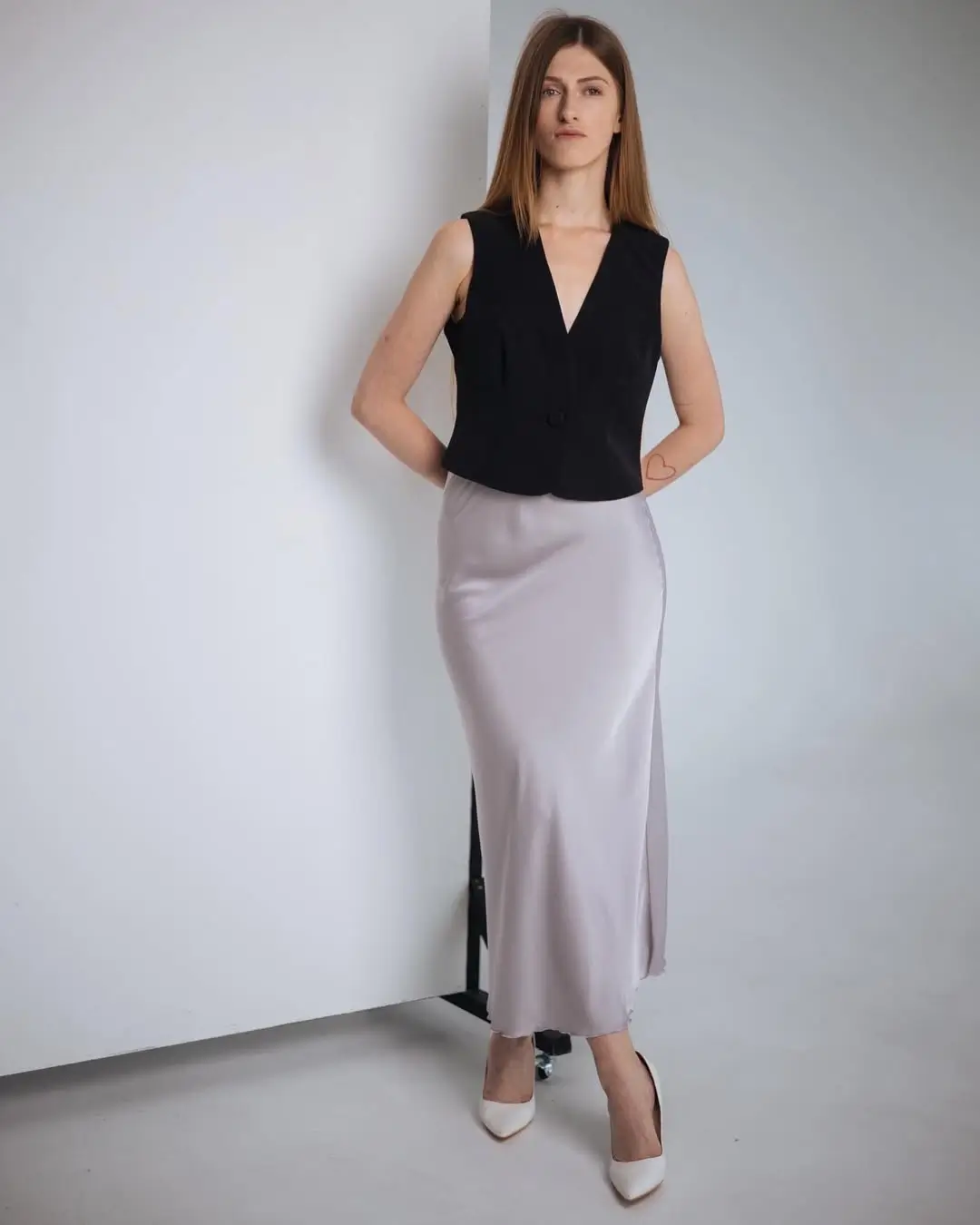 21 flowy summer skirt outfits 2026 Minimal Long Satin Skirt With Structured Black Top