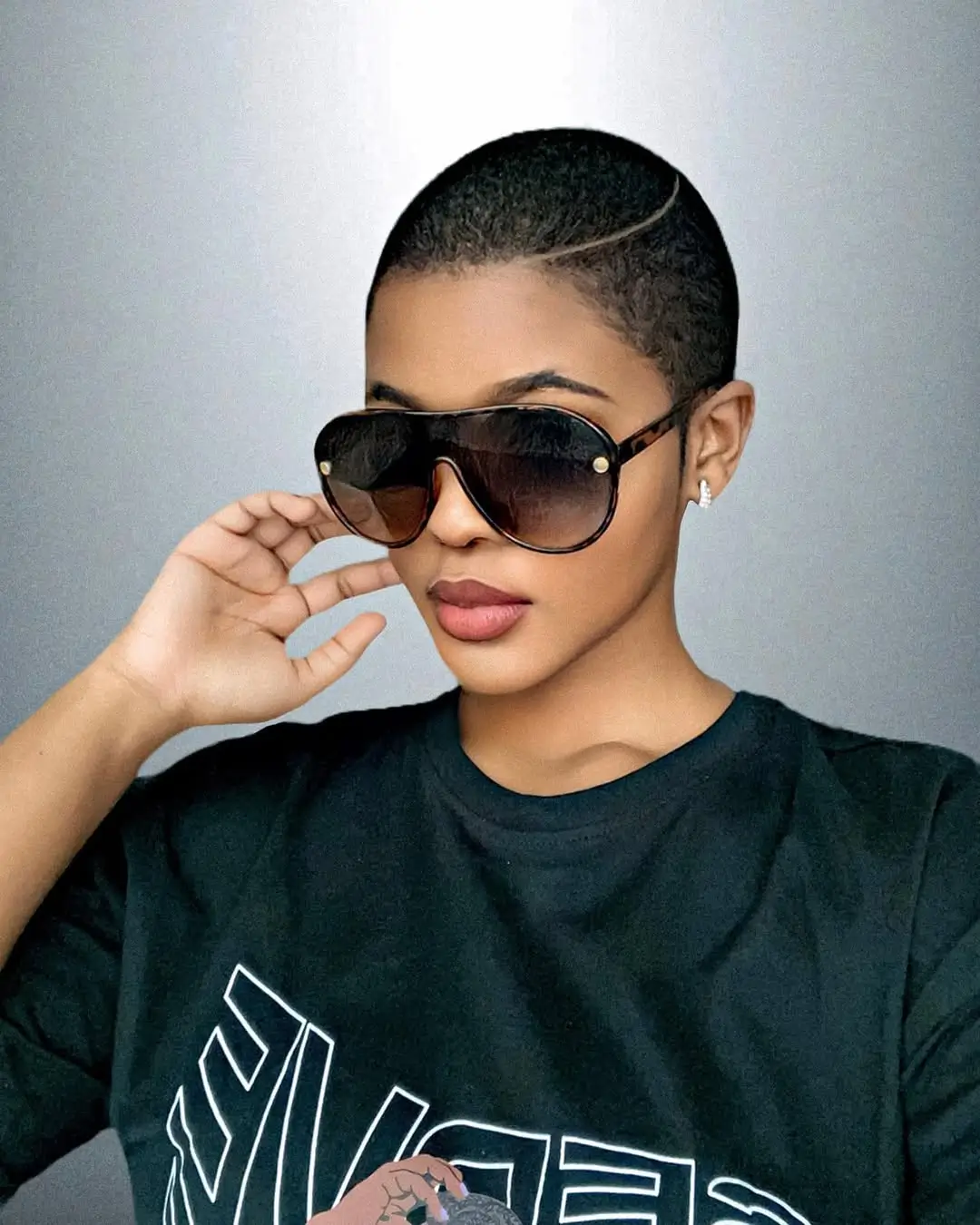 fresh summer haircut 2026 Ultra Short Buzz Cut With Graphic Detail