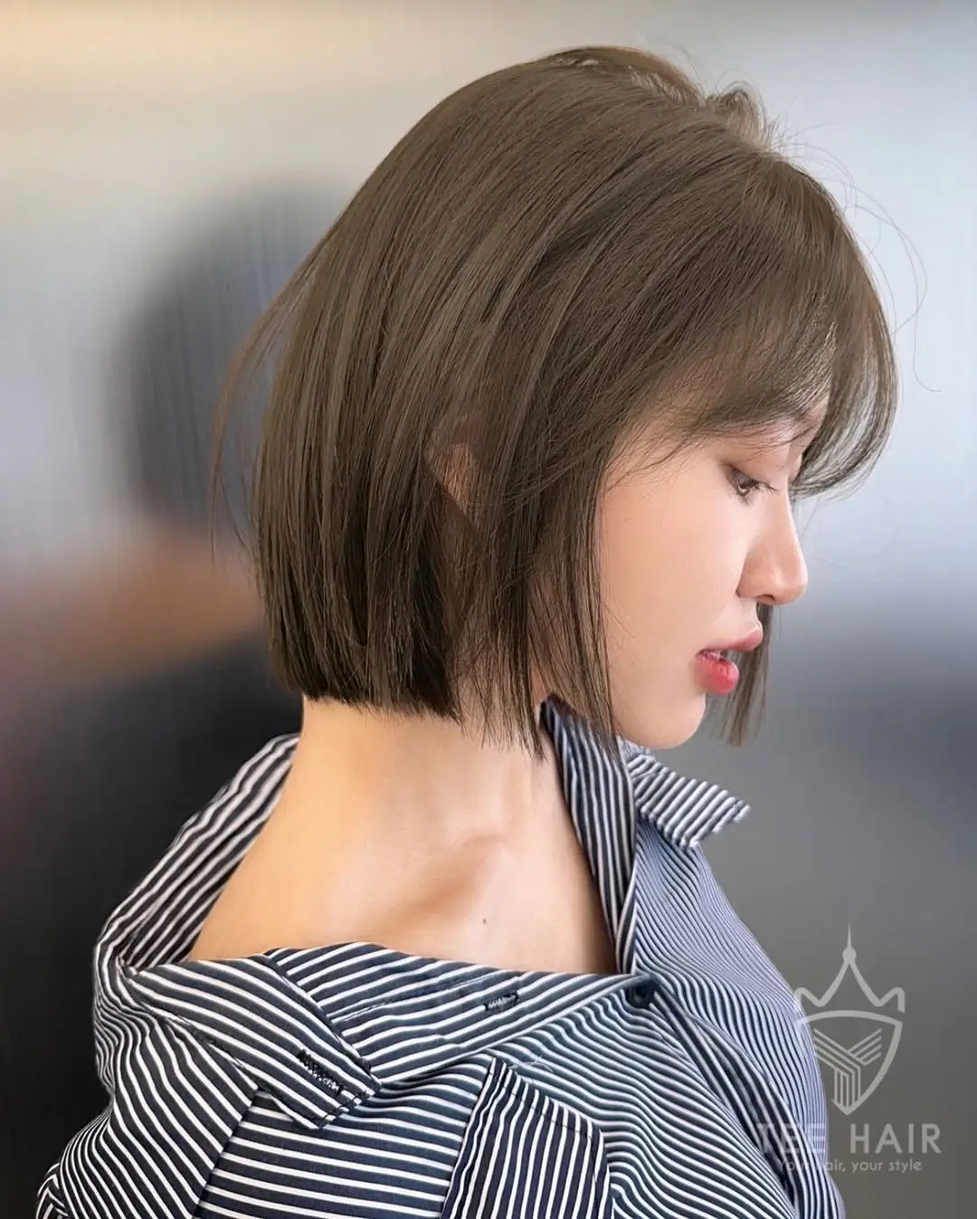fresh summer haircut 2026 Minimalist Chin Length Bob With Soft Taper