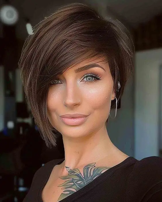 fresh summer haircut 2026 Asymmetrical Pixie Bob With Side Sweep Drama