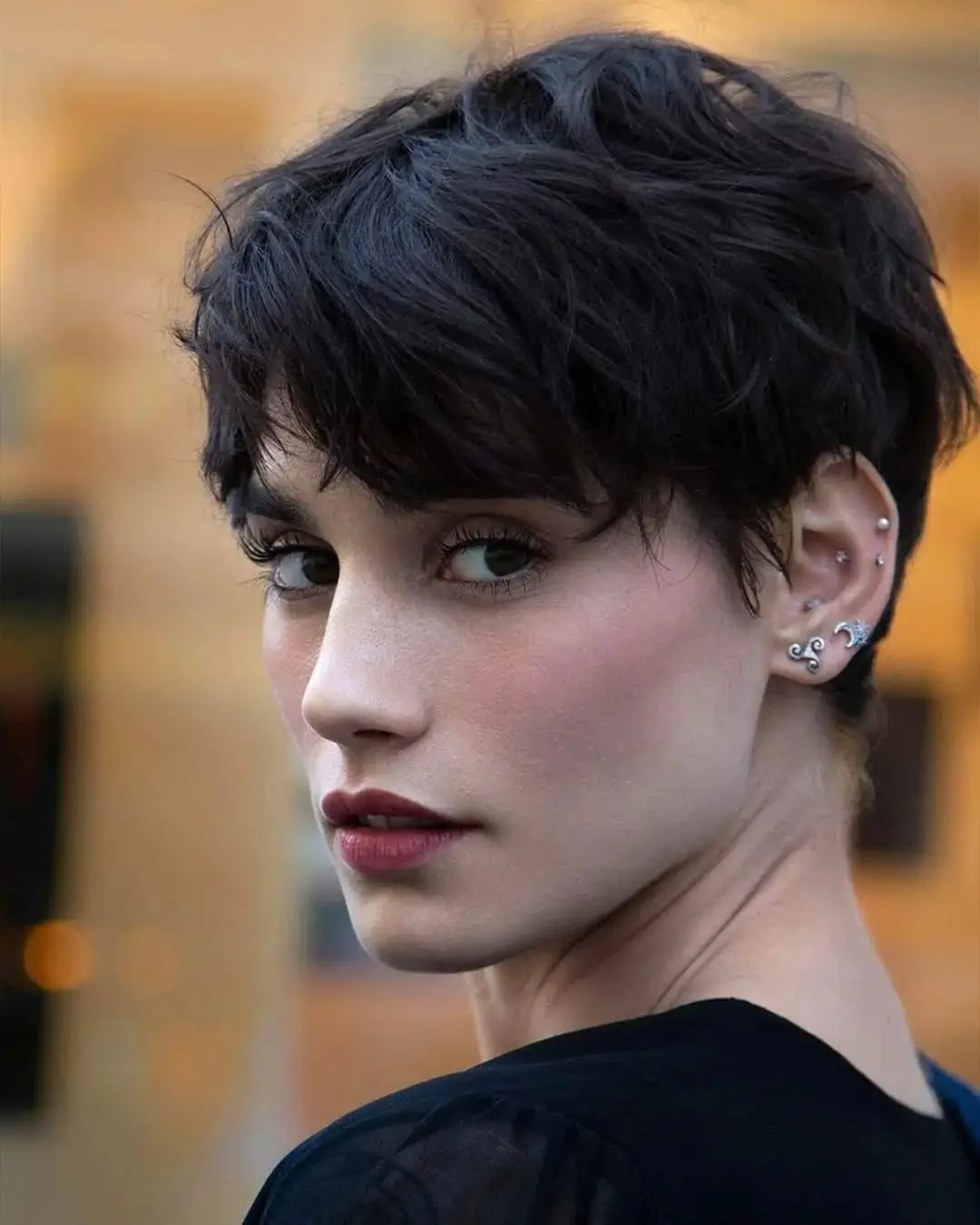 fresh summer haircut 2026 Textured Short Pixie With Feathered Layers