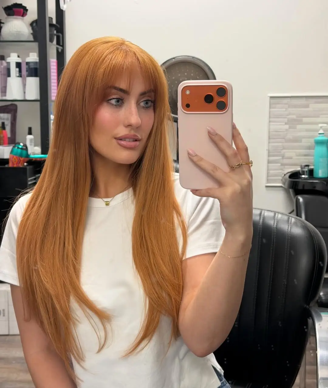 fresh summer haircut 2026 Soft Ginger Layers With Full Fringe Glow