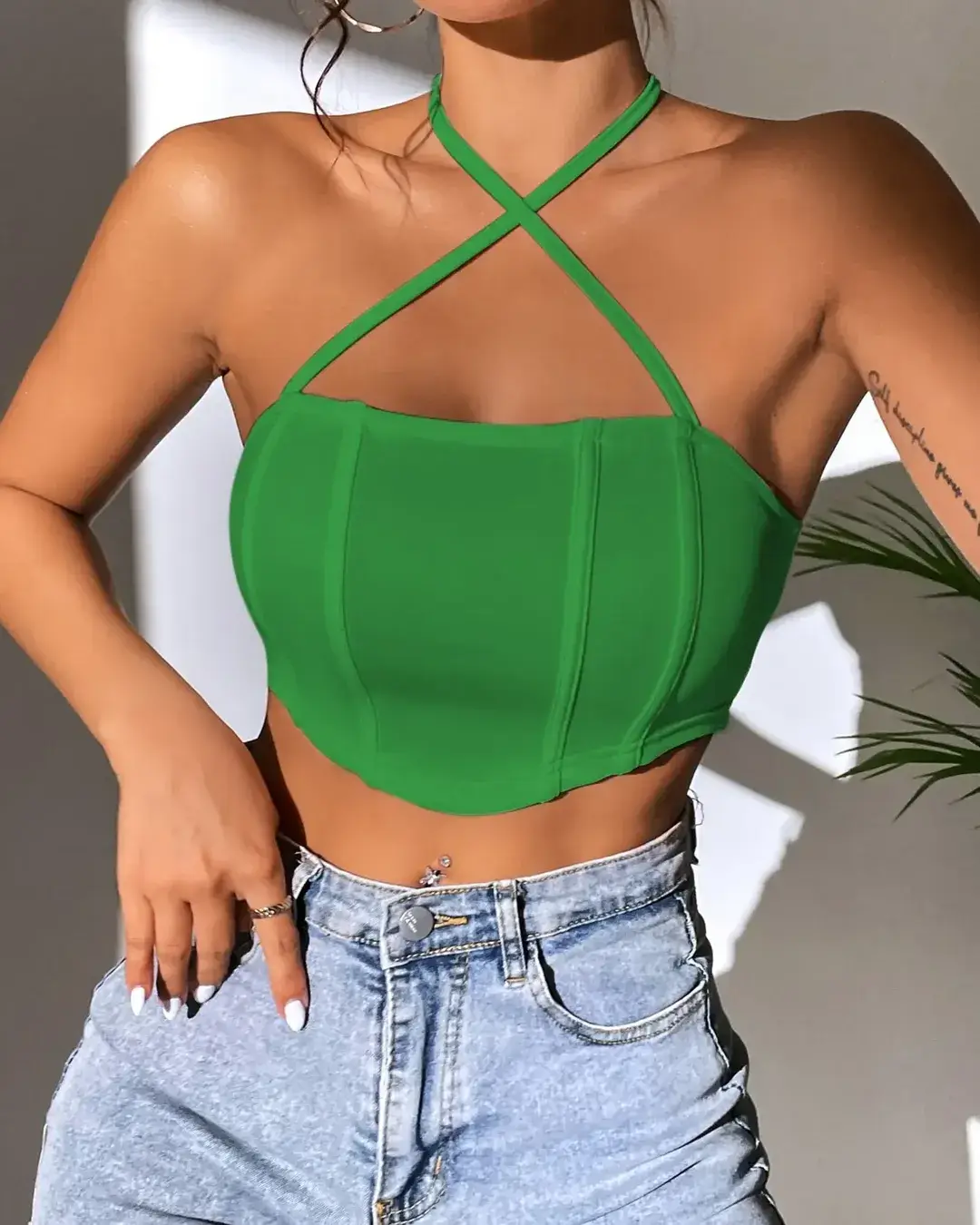 23 halter summer crop top outfits 2026 Bold Green Halter With Sculpted Lines And Modern Edge