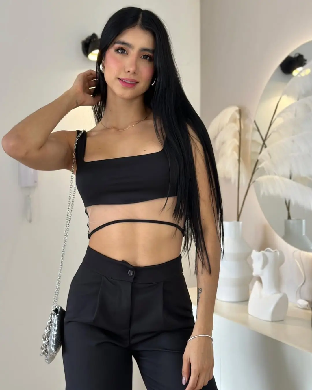 23 halter summer crop top outfits 2026 Minimal Black Halter Set With Sleek Evening Appeal