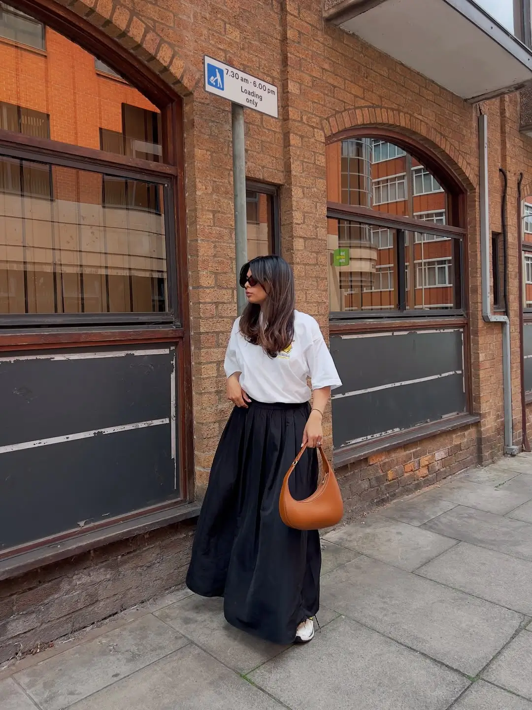 maxi skirt outfits summer 2026 Black Pleated Maxi With Effortless Street Style Feel