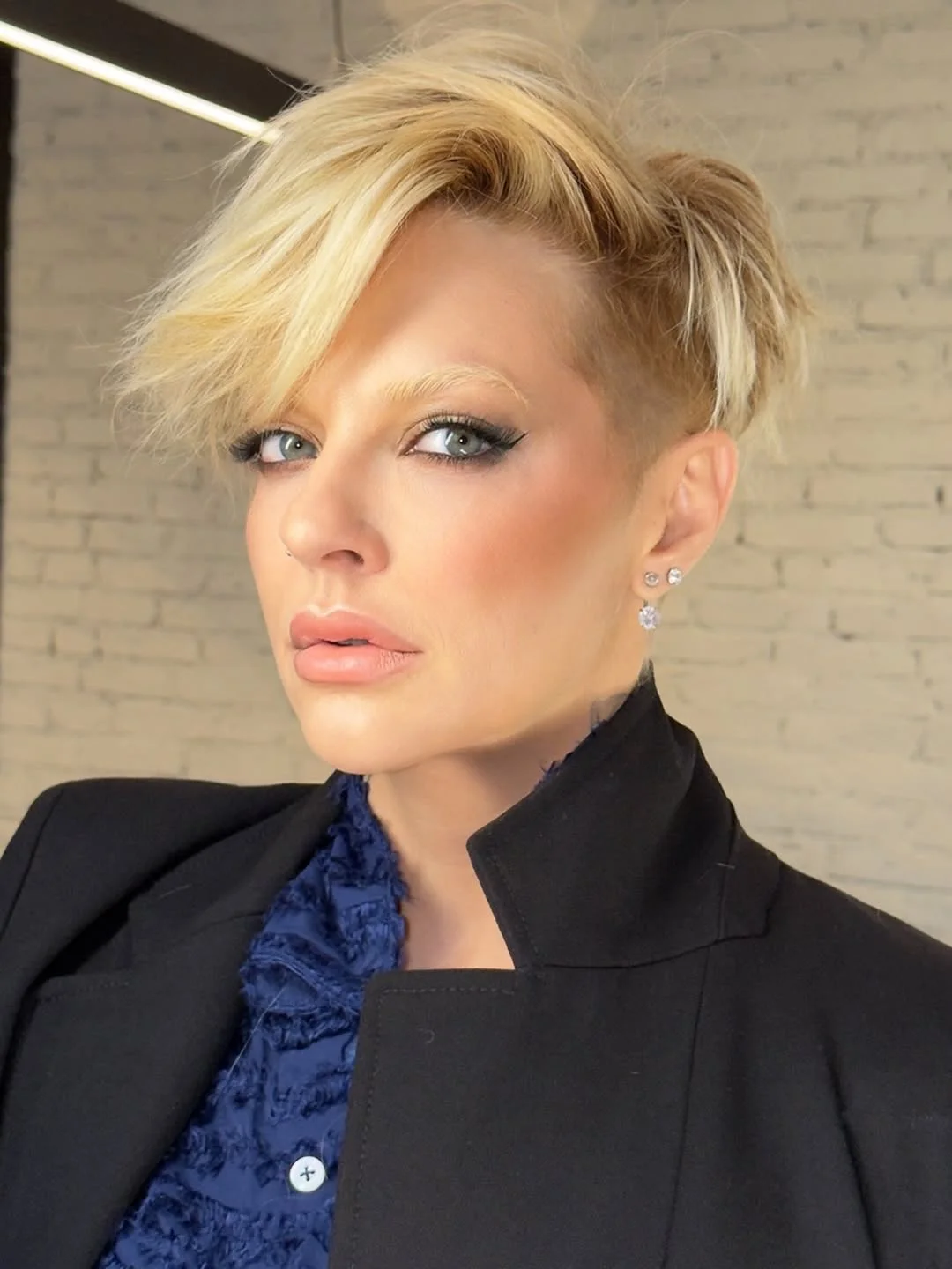 modern summer haircuts for women over 40 2026 Edgy Undercut Pixie With Tousled Volume