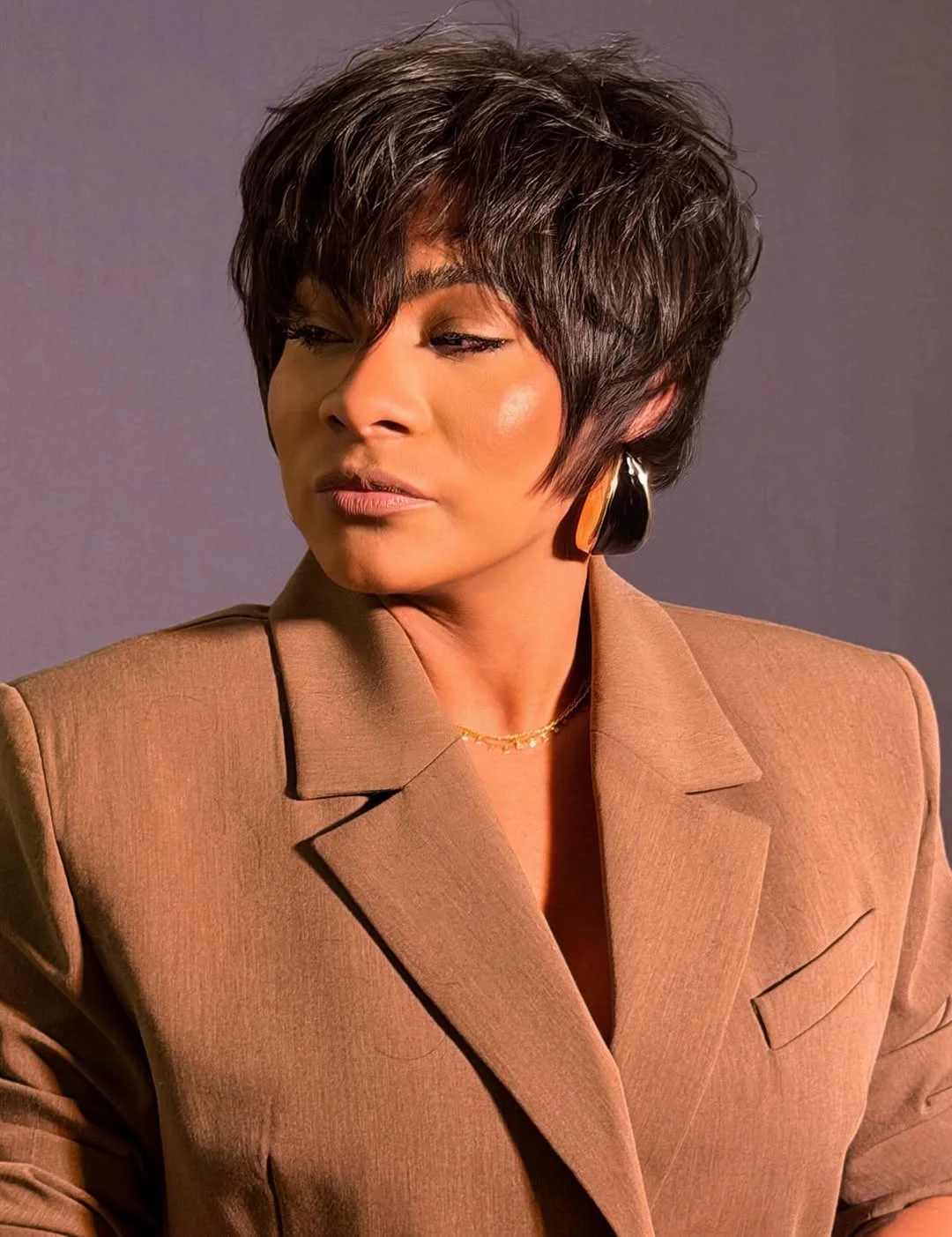 modern summer haircuts for women over 40 2026 Modern Textured Pixie With Soft Layers