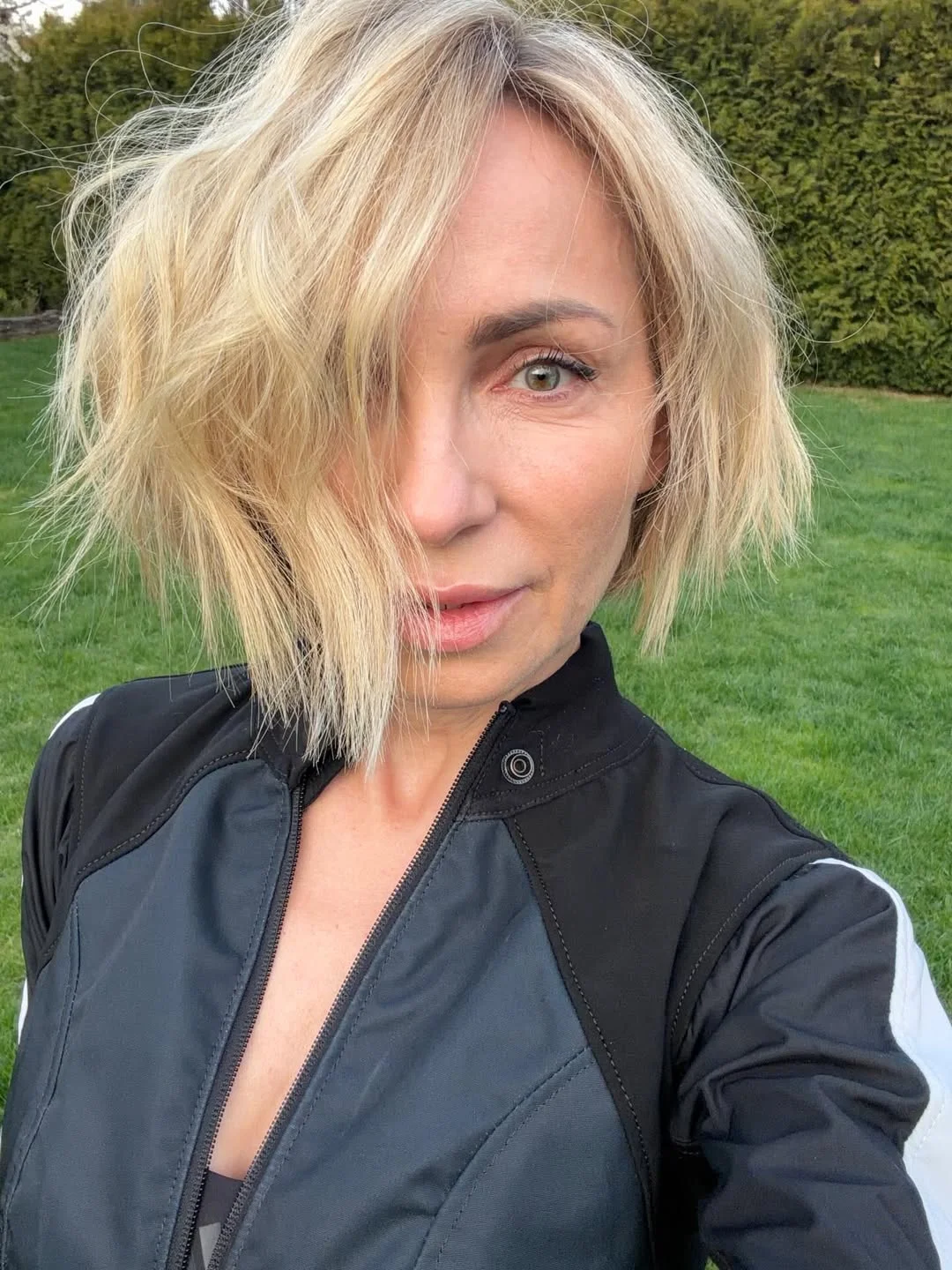 modern summer haircuts for women over 40 2026 Choppy Blonde Lob With Wind-Swept Texture