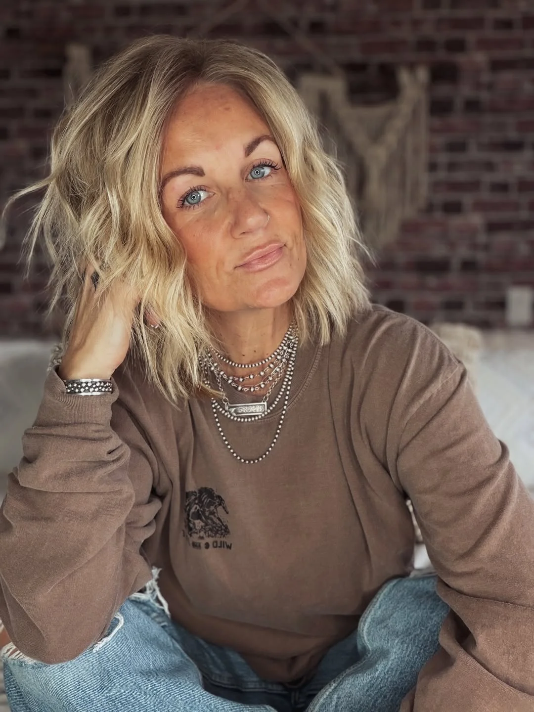 modern summer haircuts for women over 40 2026 Soft Wavy Shoulder-Length Cut With Natural Texture