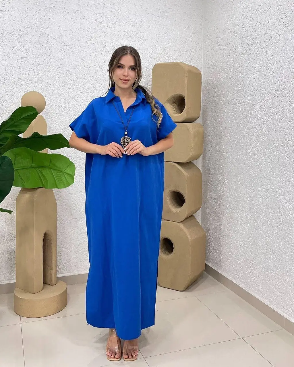 25 oversized summer outfit 2026 Flowing oversized blue dress for effortless modest elegance