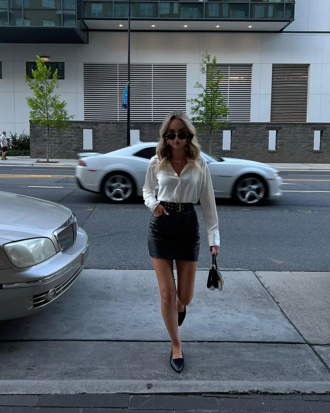 25 summer business casual outfit 2026 minimal monochrome with a sleek leather skirt twist