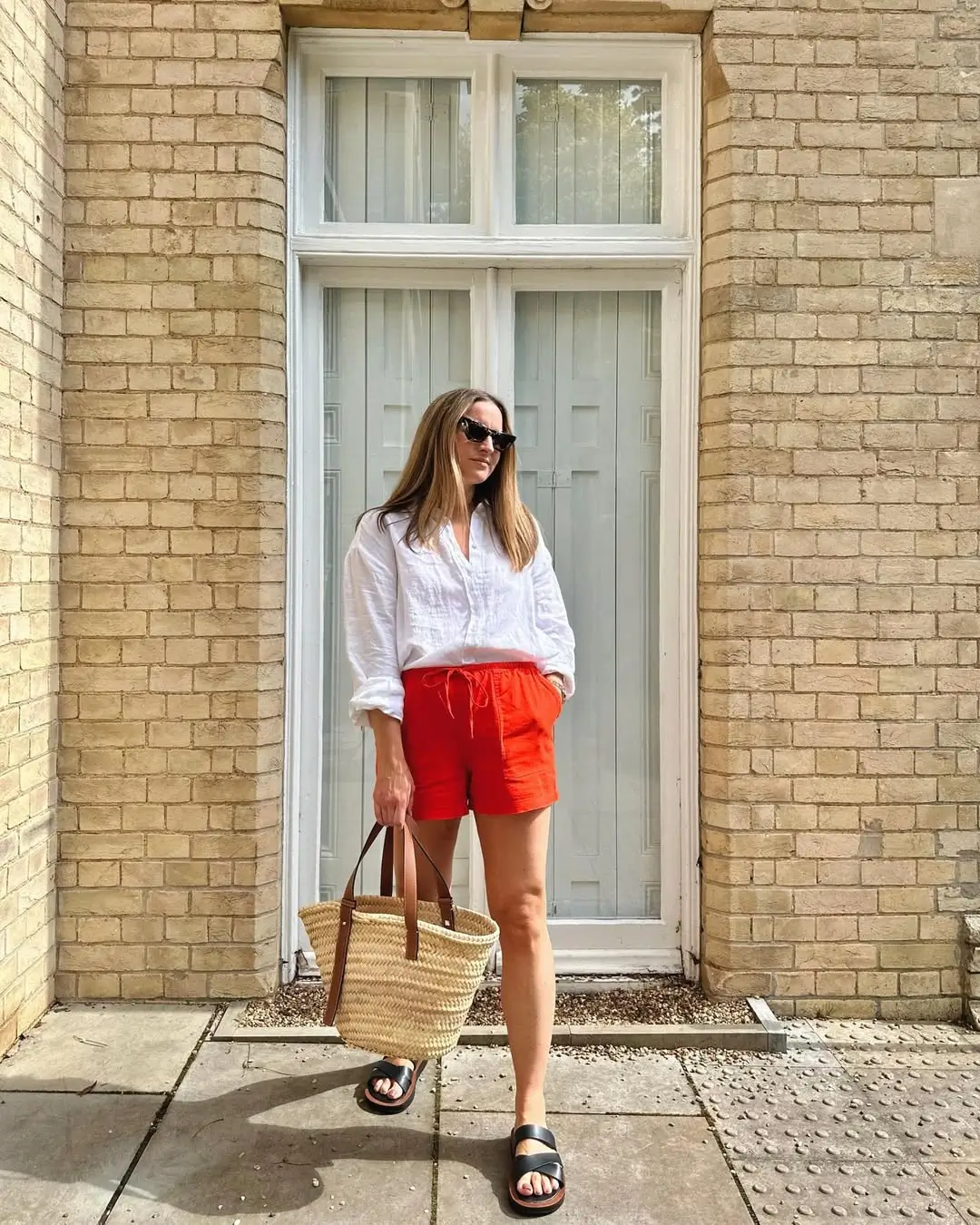 24 summer linen outfits 2026 White Shirt and Red Linen Shorts That Feel Instantly Alive