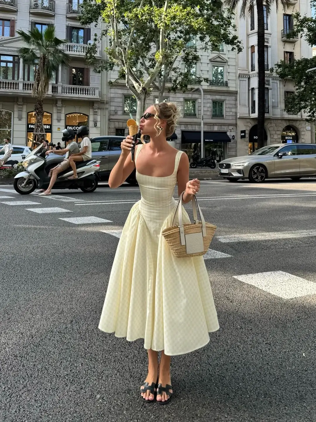 24 summer sleeveless dresses 2026 Butter Yellow Midi Dress with a Playful City Twist