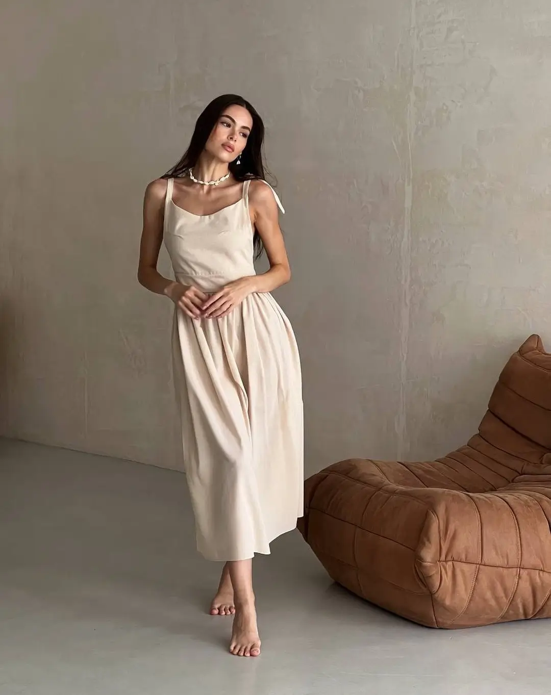 24 summer sleeveless dresses 2026 Minimal Beige Midi Dress With Quiet Luxury Energy