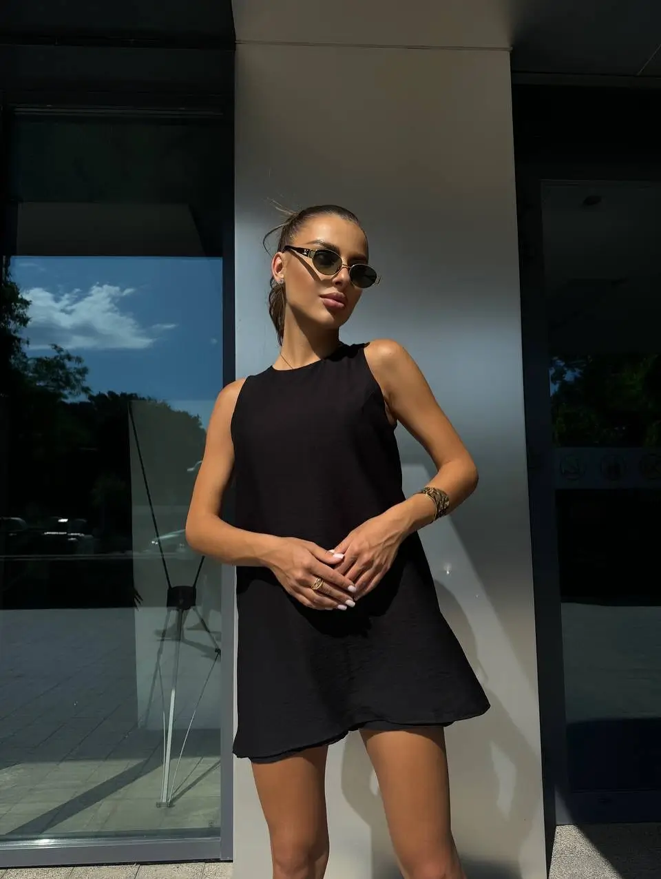 24 summer sleeveless dresses 2026 Effortless Black Mini Dress for That Clean City Look