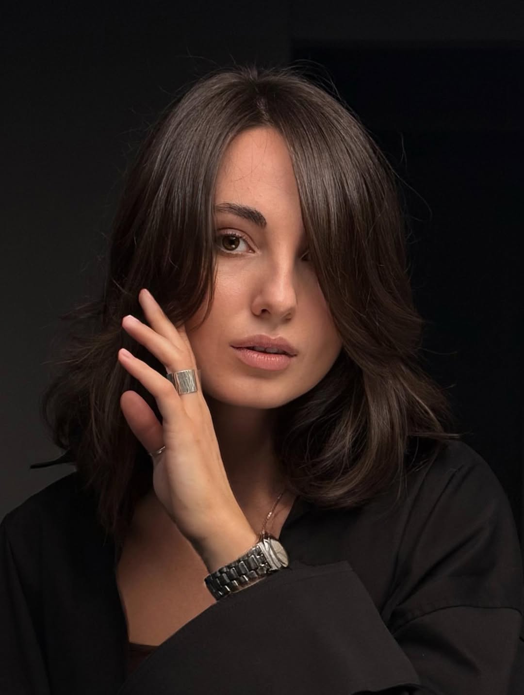 textured summer haircuts for medium hair 2026 Dark Layered Movement with Face Framing Depth